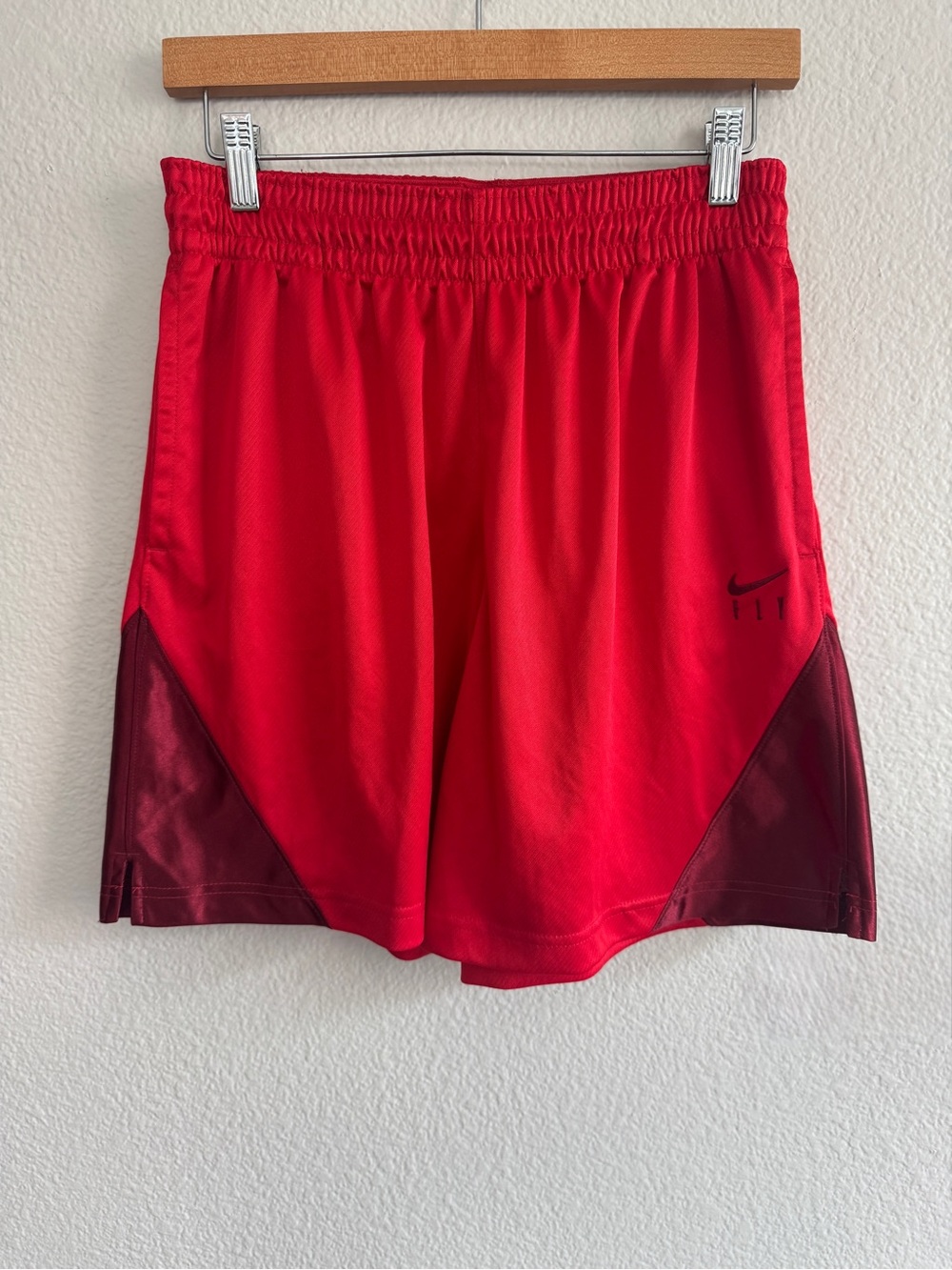 Nike Women's Red Athletic Shorts with Maroon Accents